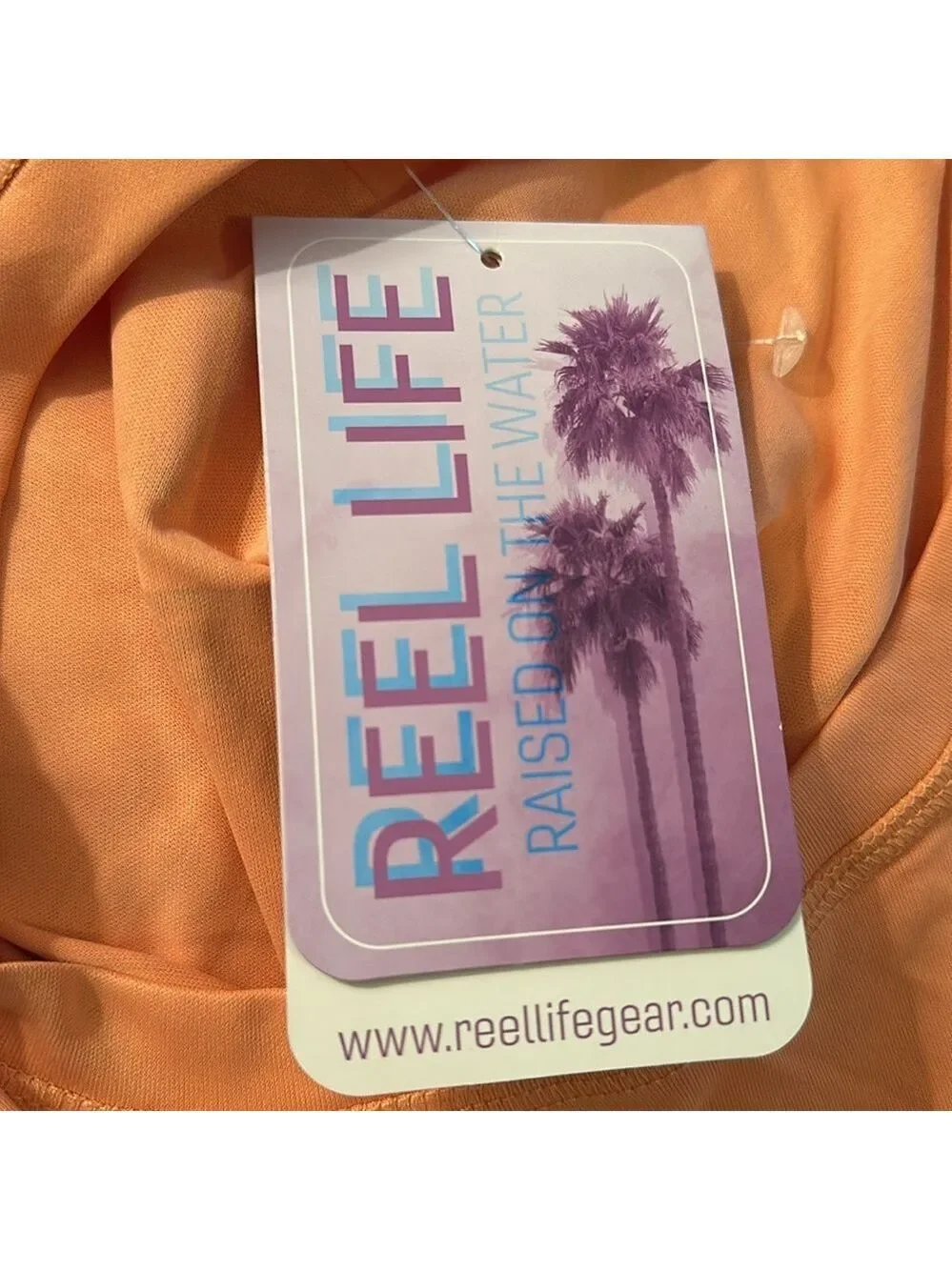 Reel Life XXL Orange Long Sleeve Shirt with a caught fish on back